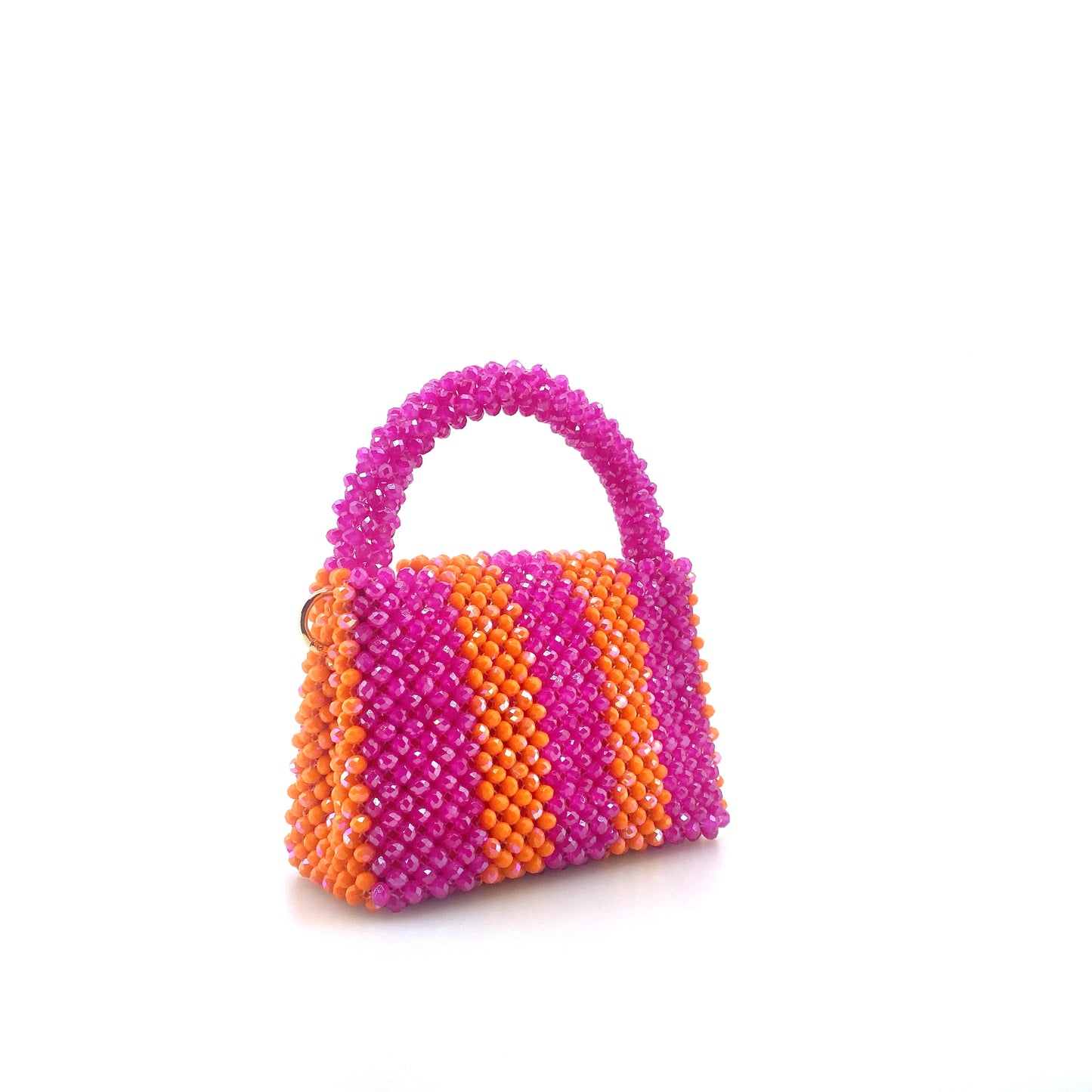pink and orange stripe beaded handbag. on white background