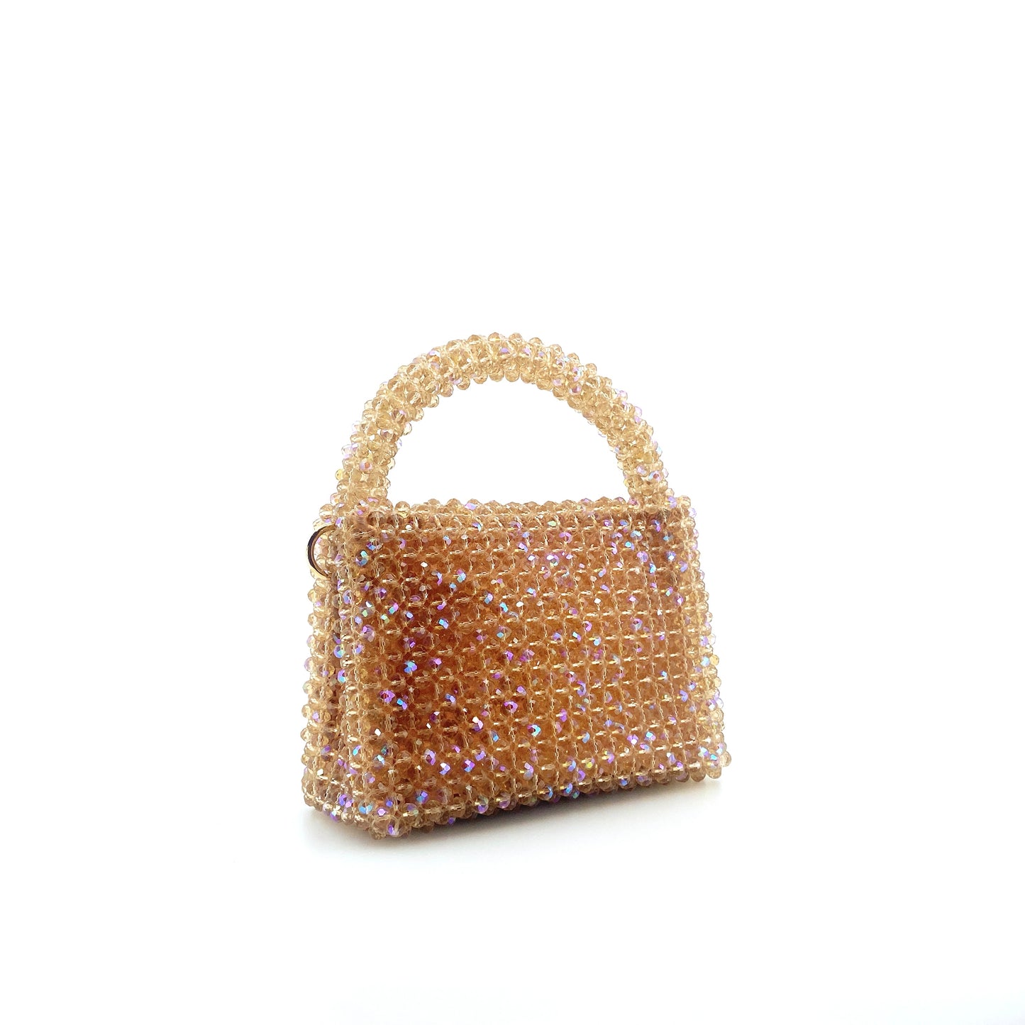 beige beaded handbag. on white background