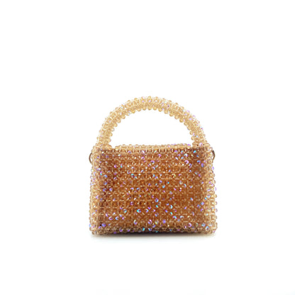 beige beaded handbag. on white background