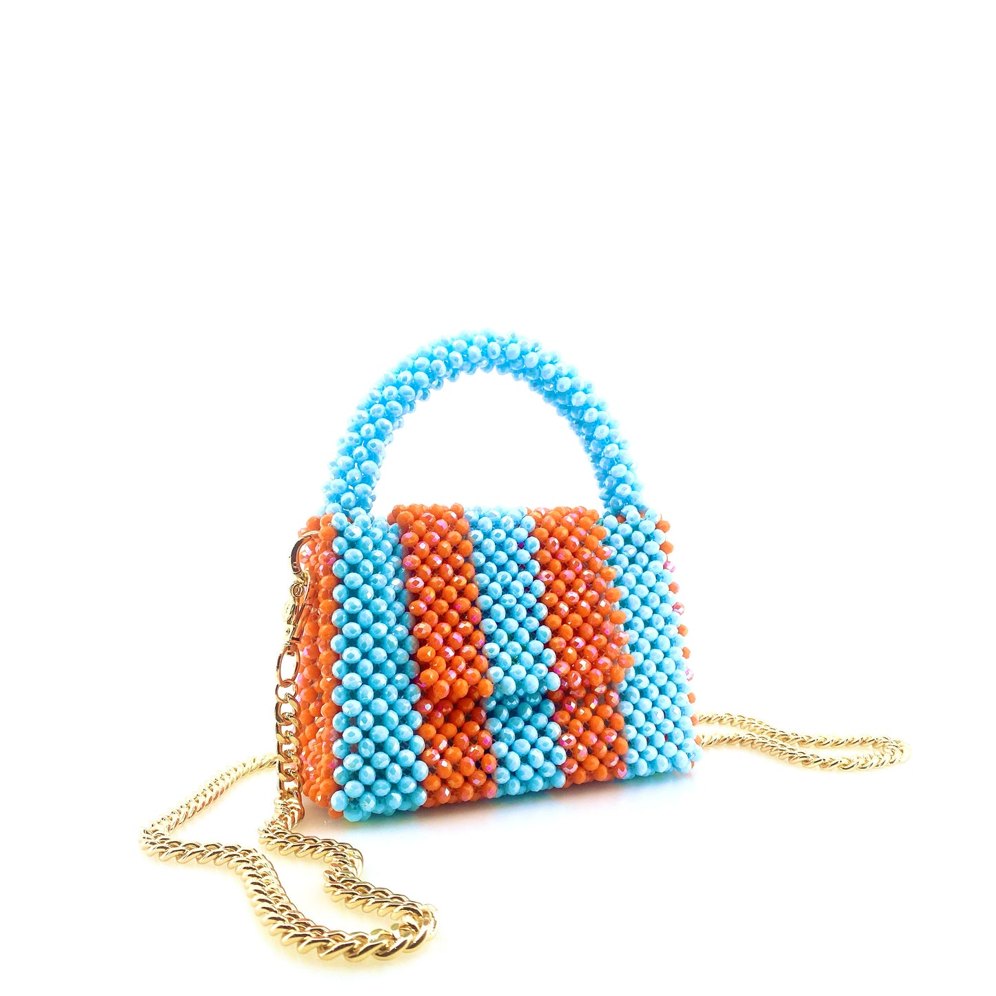 blue and orange stripe beaded handbag with gold chain. on white background