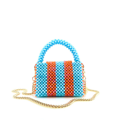 blue and orange stripe beaded handbag with gold chain. on white background