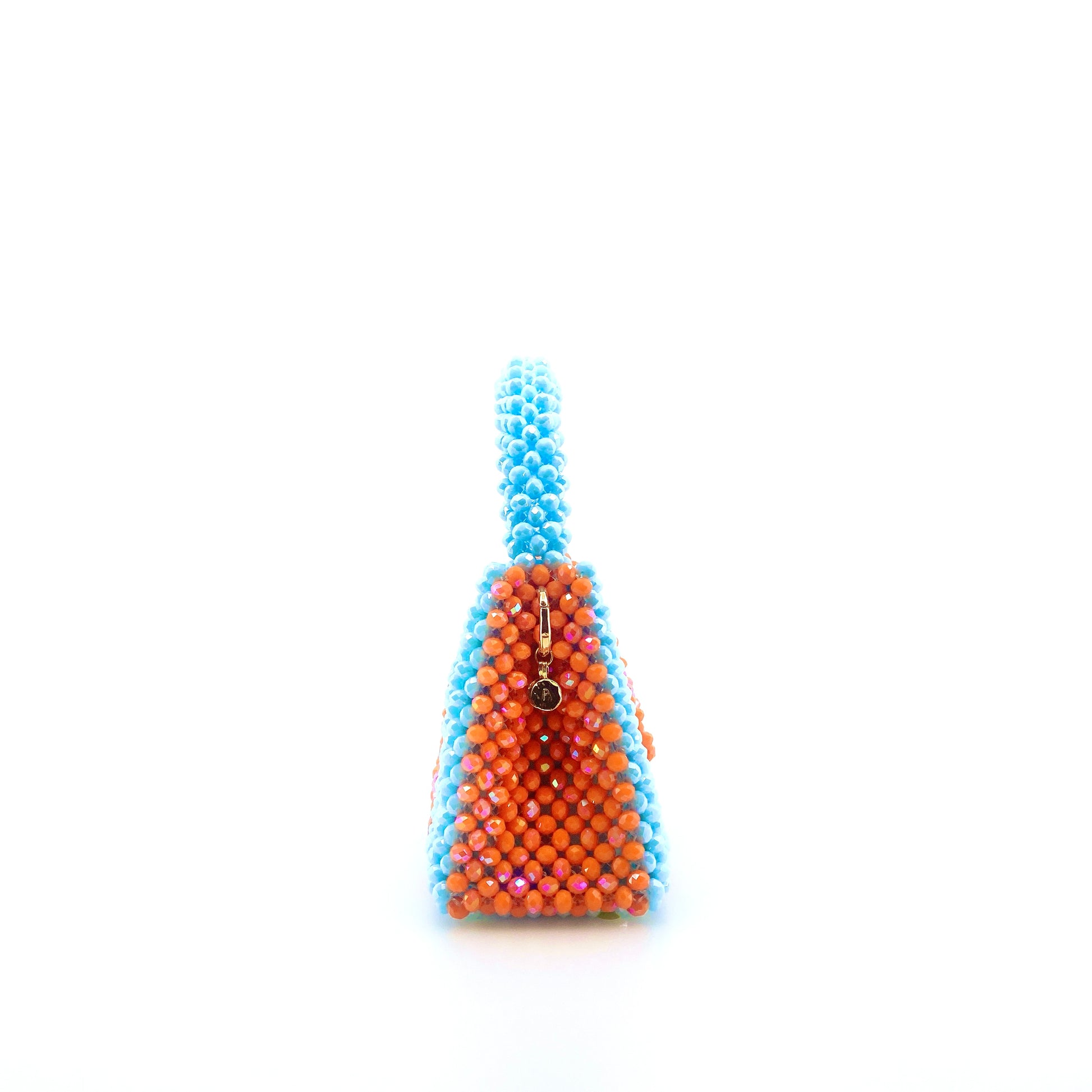 blue and orange stripe beaded handbag. on white background