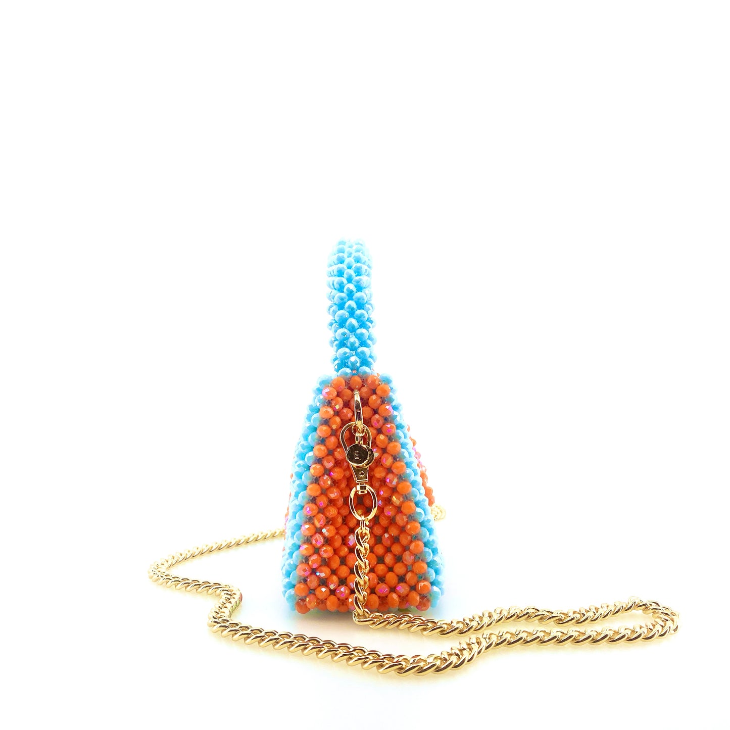 blue and orange stripe beaded handbag with gold chain. on white background