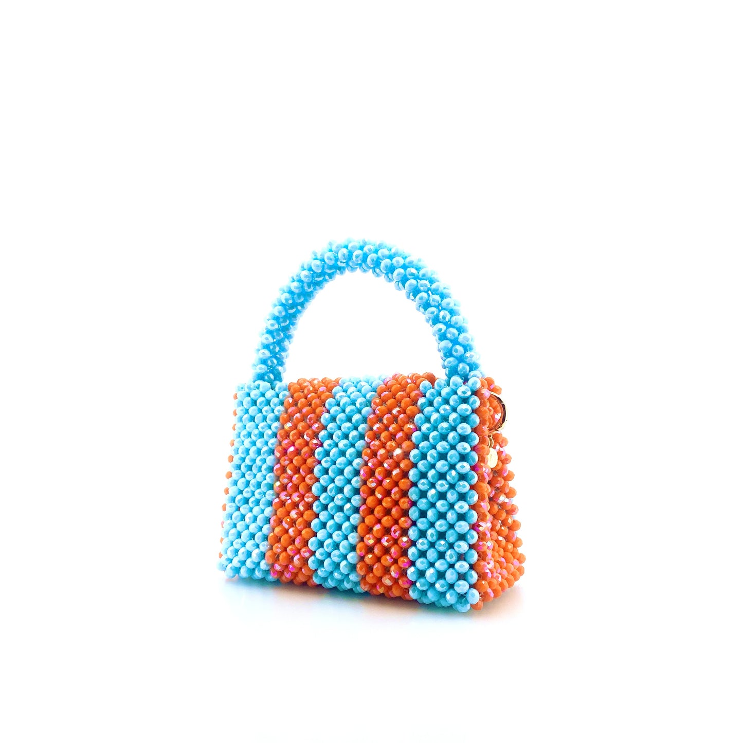 blue and orange stripe beaded handbag. on white background