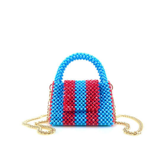 blue and red stripe beaded handbag with gold chain. on white background