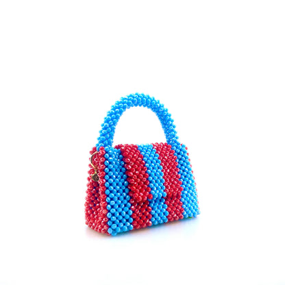 blue and red stripe beaded handbag. on white background