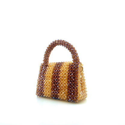 brown and beige stripe beaded bag. on white background