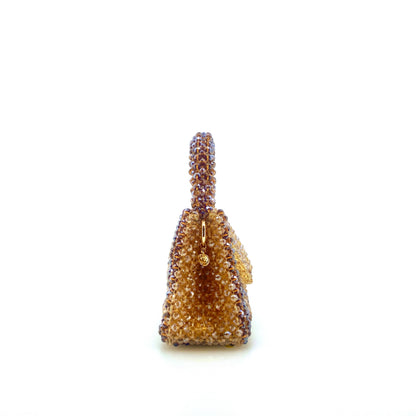 brown and beige stripe beaded bag. on white background