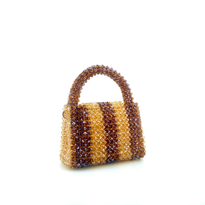 brown and beige stripe beaded bag. on white background