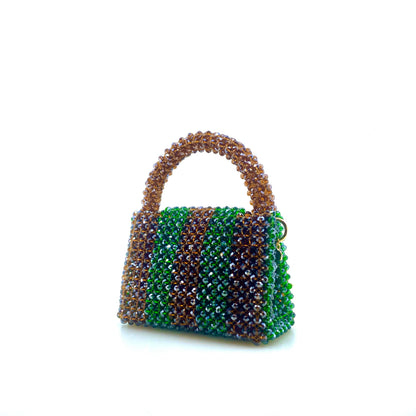 brown and green stripe beaded handbag. on white background