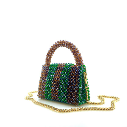 brown and green stripe beaded handbag with gold chain. on white background