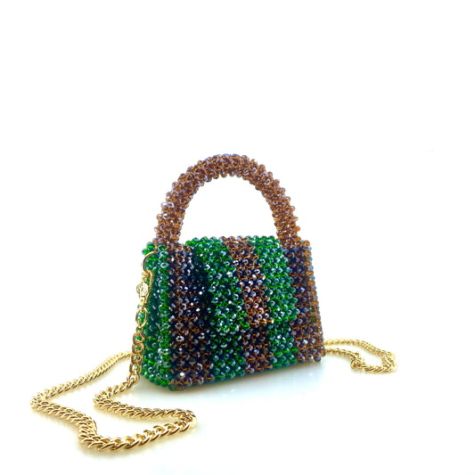 brown and green stripe beaded handbag with gold chain. on white background
