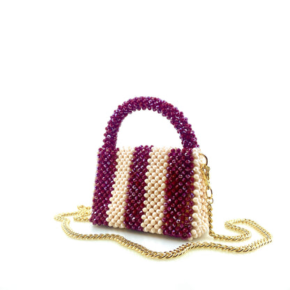 burgundy and cream stripe beaded handbag with gold chain. on white background