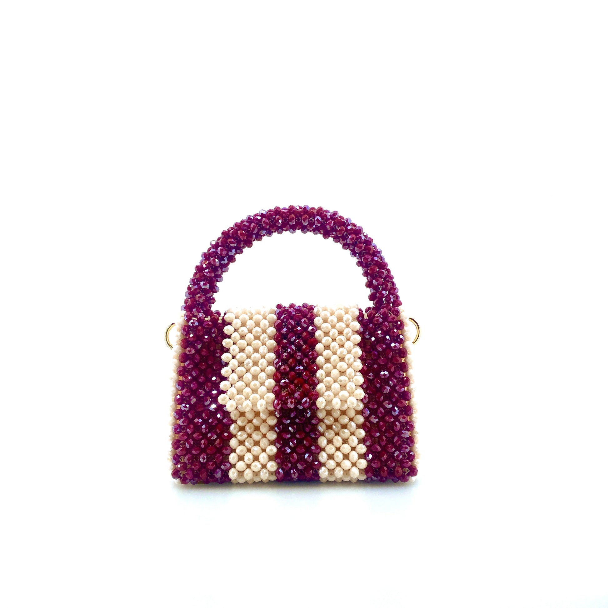 burgundy and cream stripe beaded handbag. on white background