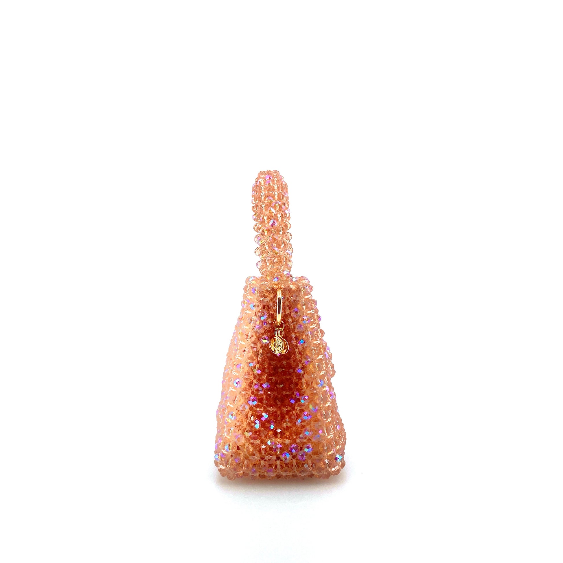 coral pink beaded handbag. on white background 