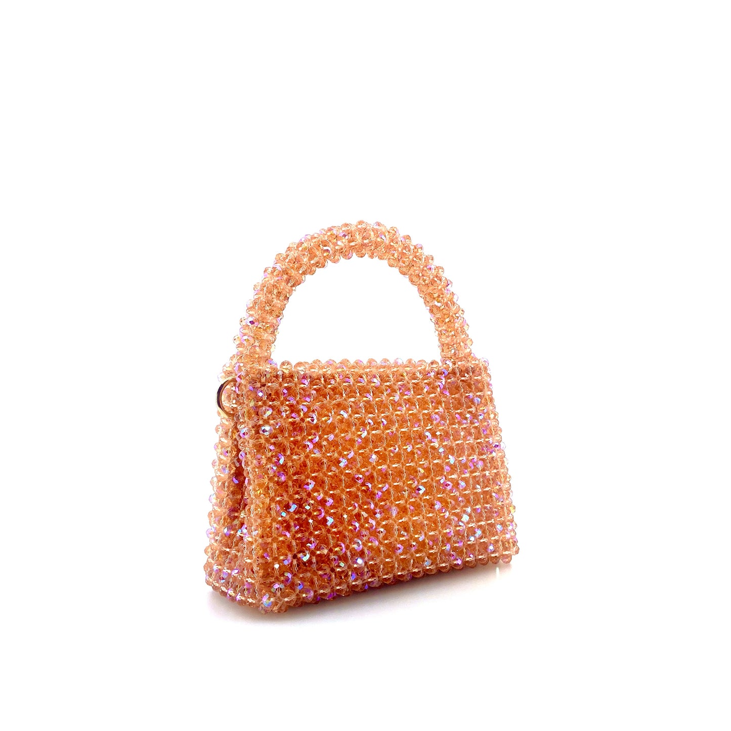 coral pink beaded handbag. on white background 