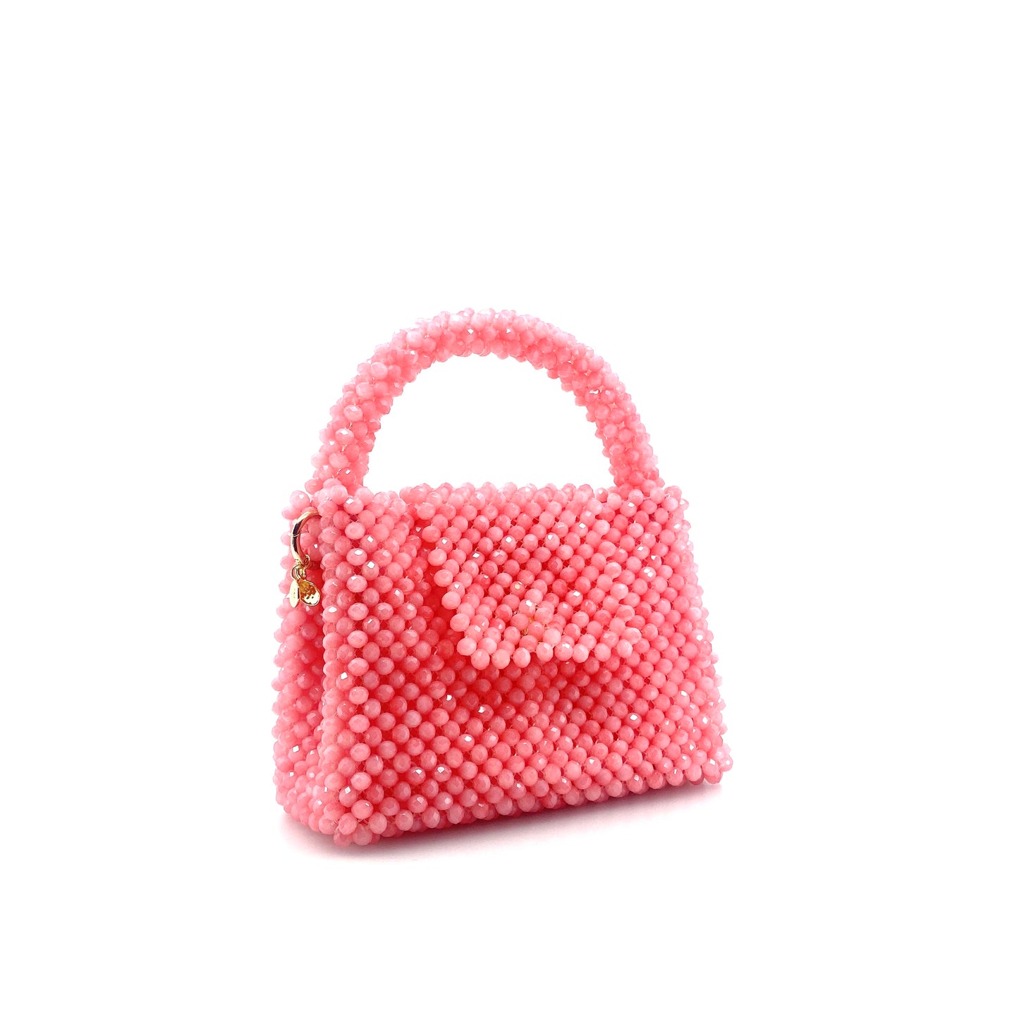 pink beaded handbag. on white background 