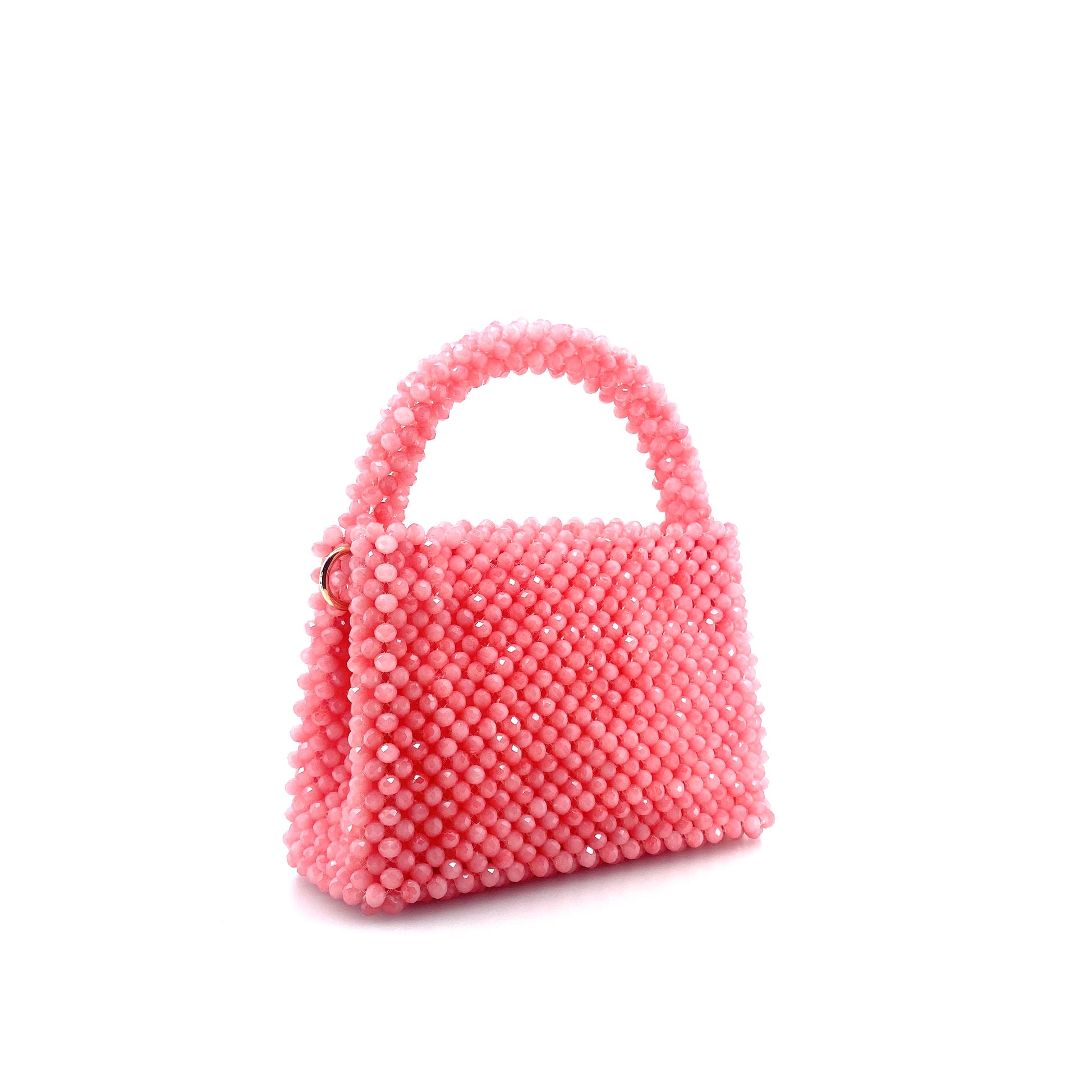 pink beaded handbag. on white background 