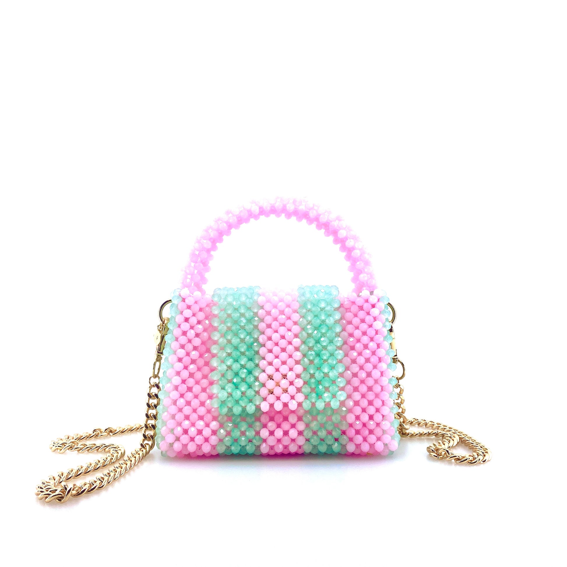 green and pink stripe beaded handbag with gold chain. on white background