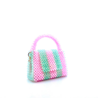 green and pink stripe beaded handbag. on white background