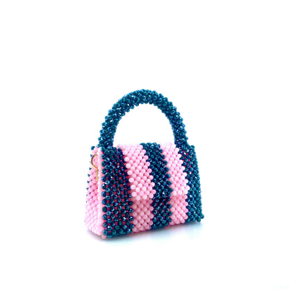 green and pink stripe beaded handbag. on white background