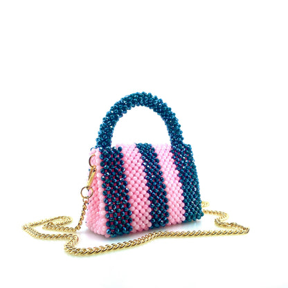 green and pink stripe beaded handbag with gold chain. on white background