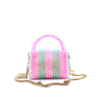 green and pink stripe beaded handbag with gold chain. on white background