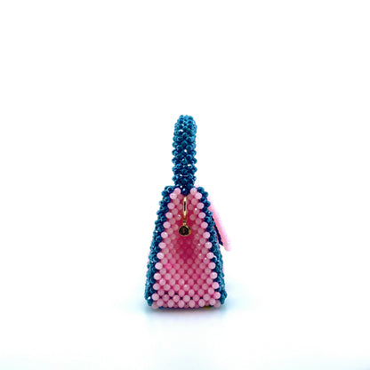 green and pink stripe beaded handbag. on white background
