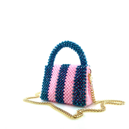 green and pink stripe beaded handbag with gold chain. on white background