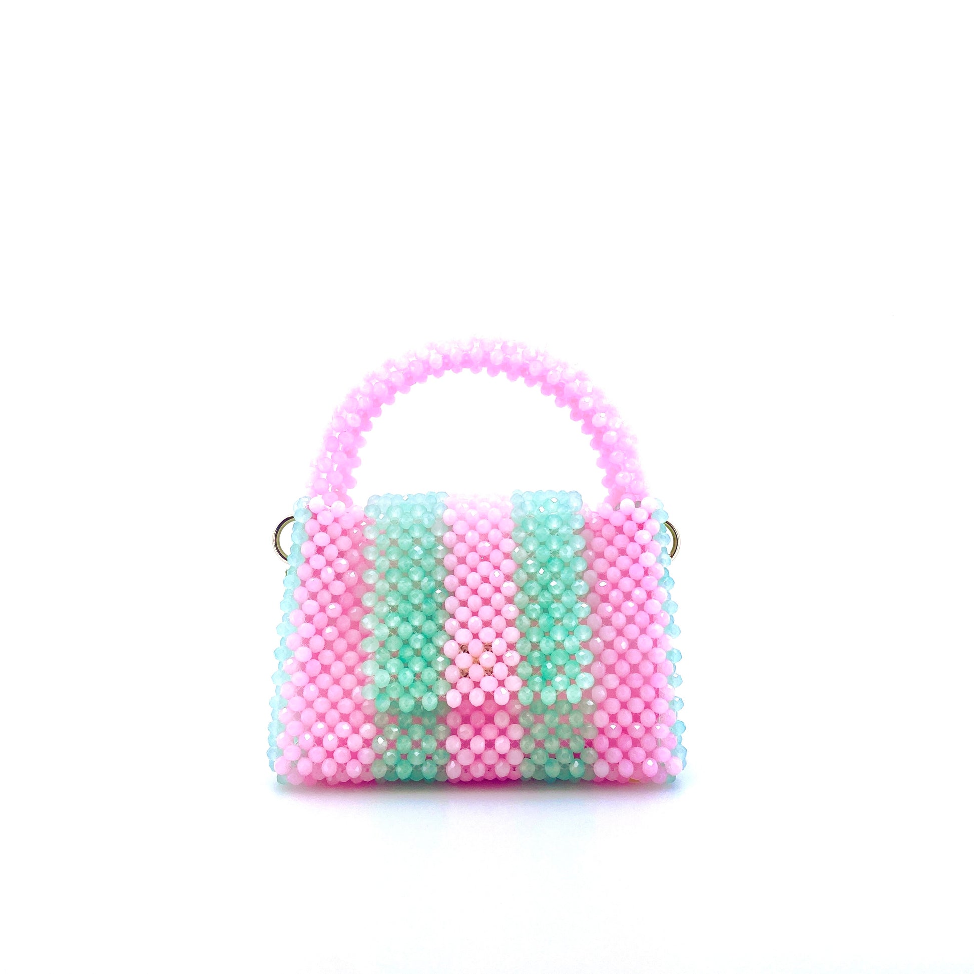 green and pink stripe beaded handbag. on white background