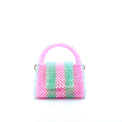 green and pink stripe beaded handbag. on white background