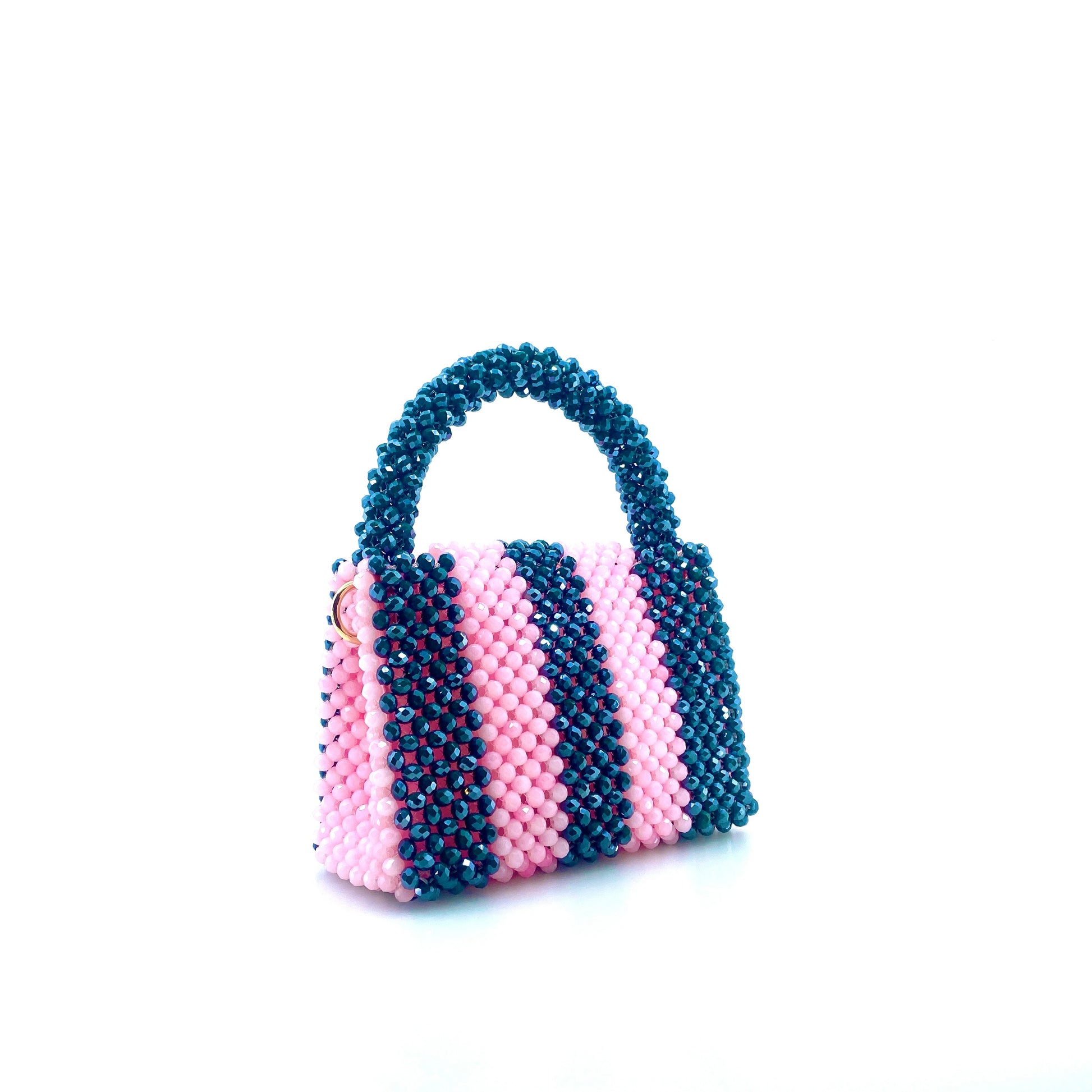 green and pink stripe beaded handbag. on white background