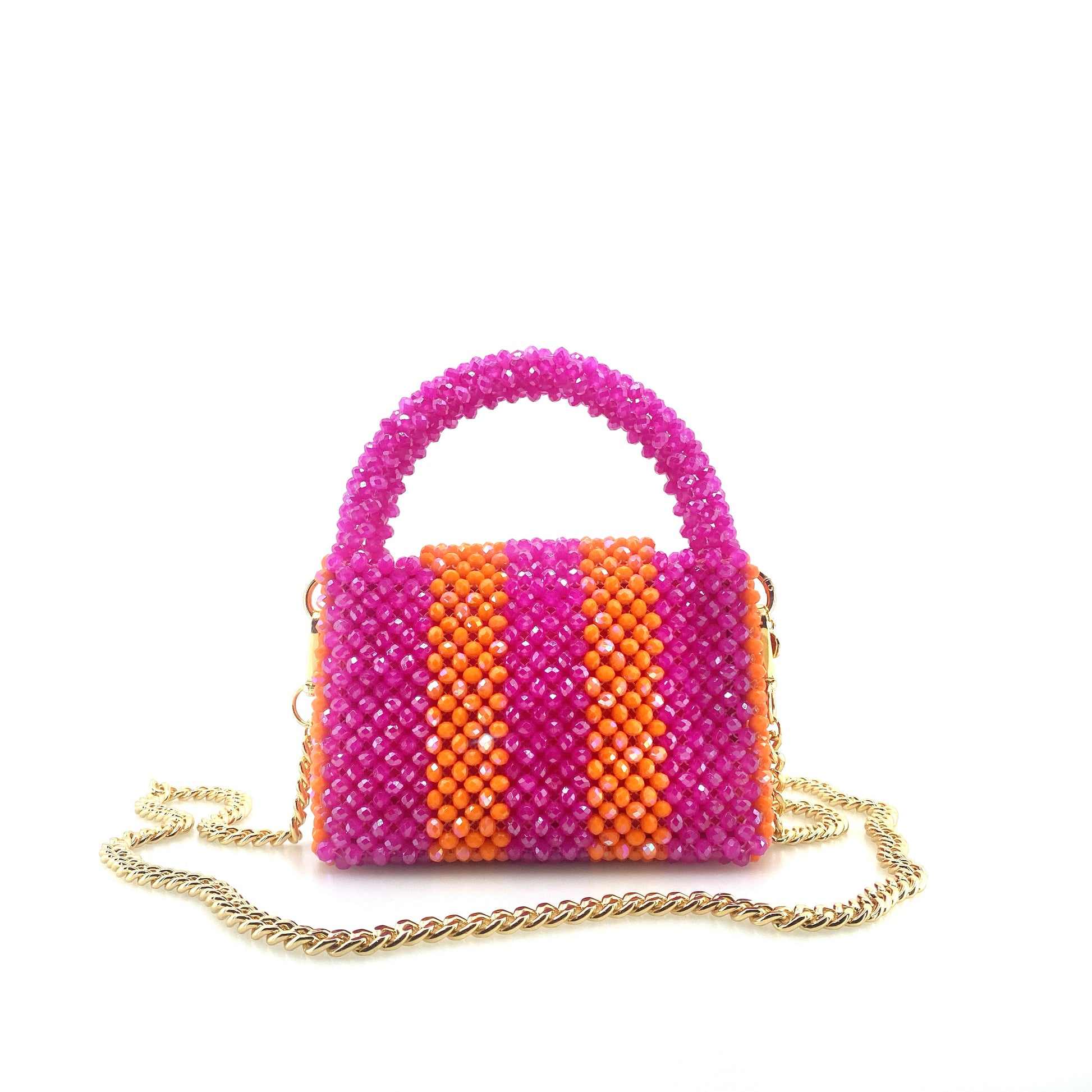 pink and orange stripe beaded handbag with gold chain. on white background