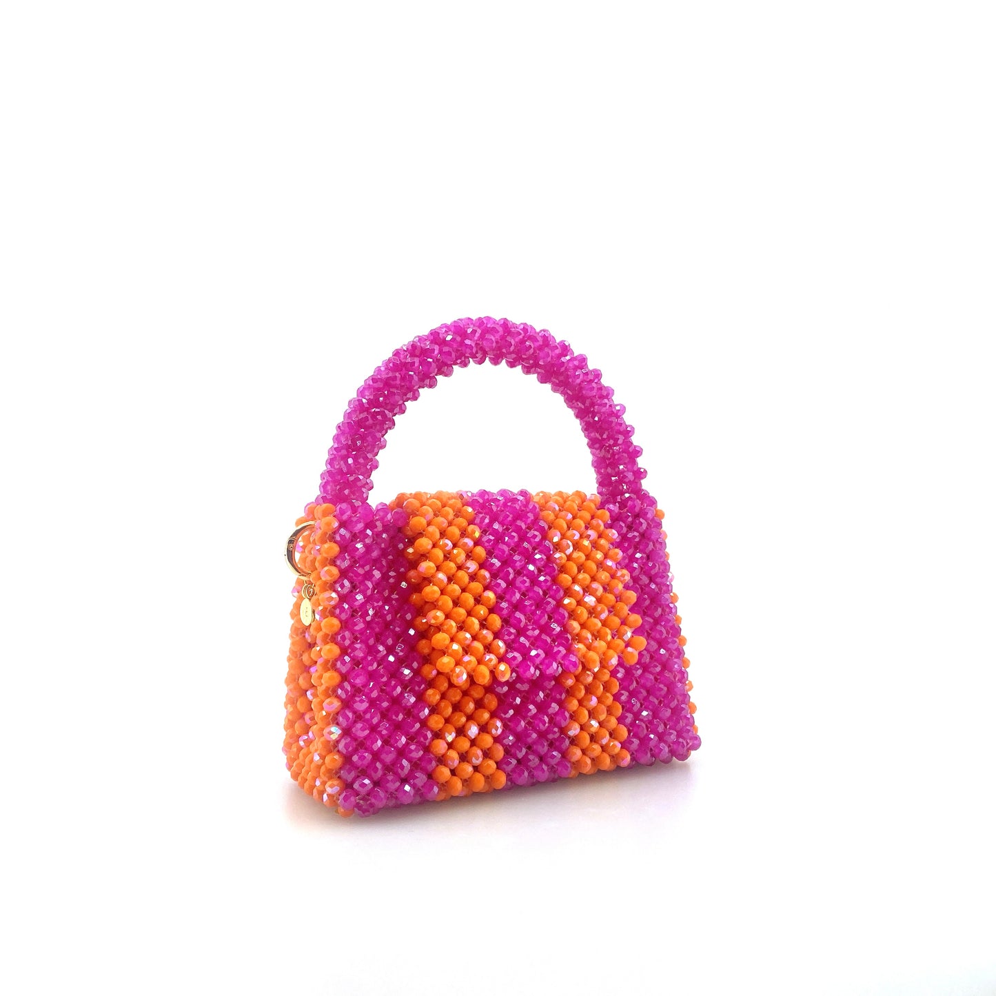 pink and orange stripe beaded handbag. on white background