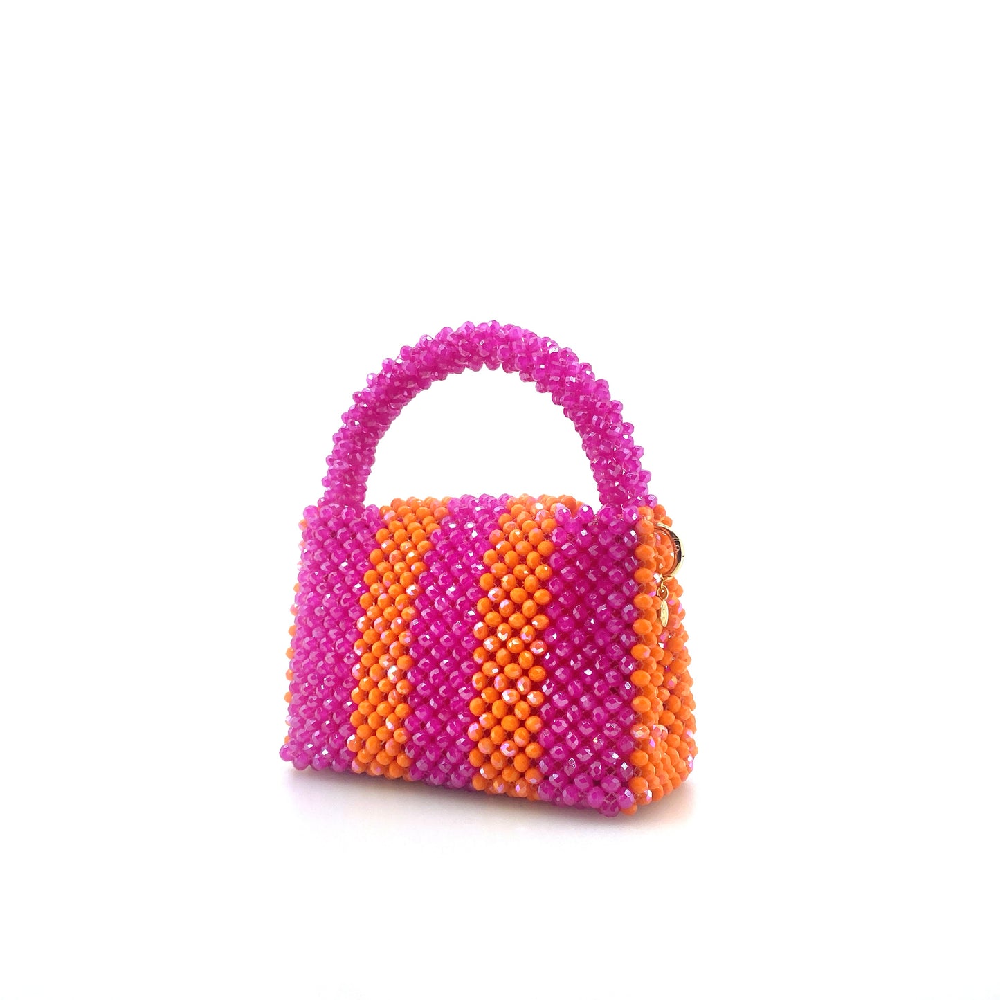pink and orange stripe beaded handbag. on white background