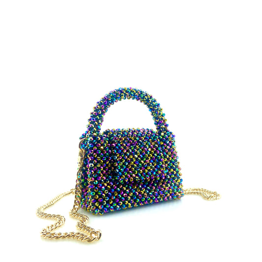 multicoloured rainbow beaded handbag with gold chain. on white background