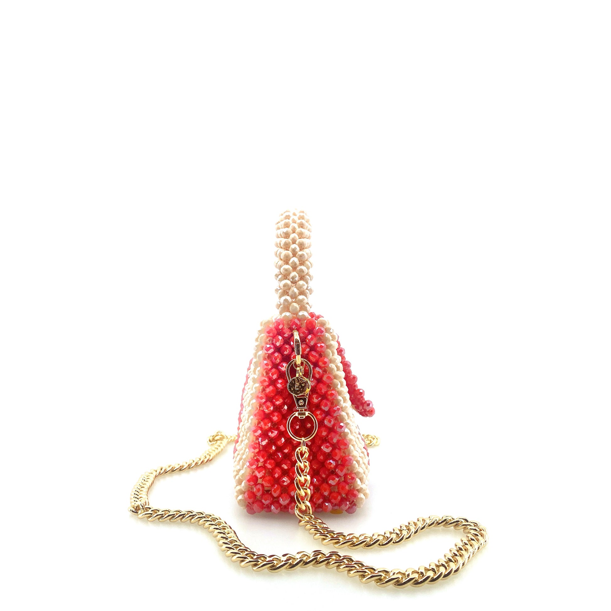 cream and red stripe beaded handbag with gold chain. on white background