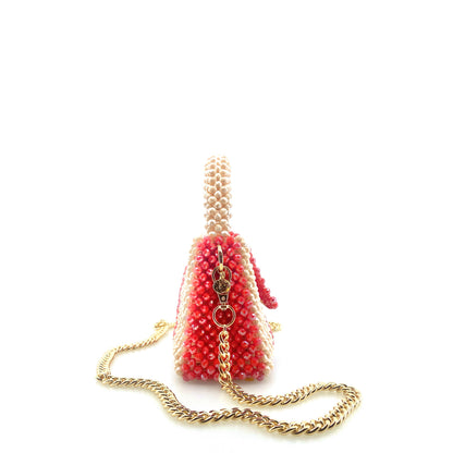 cream and red stripe beaded handbag with gold chain. on white background