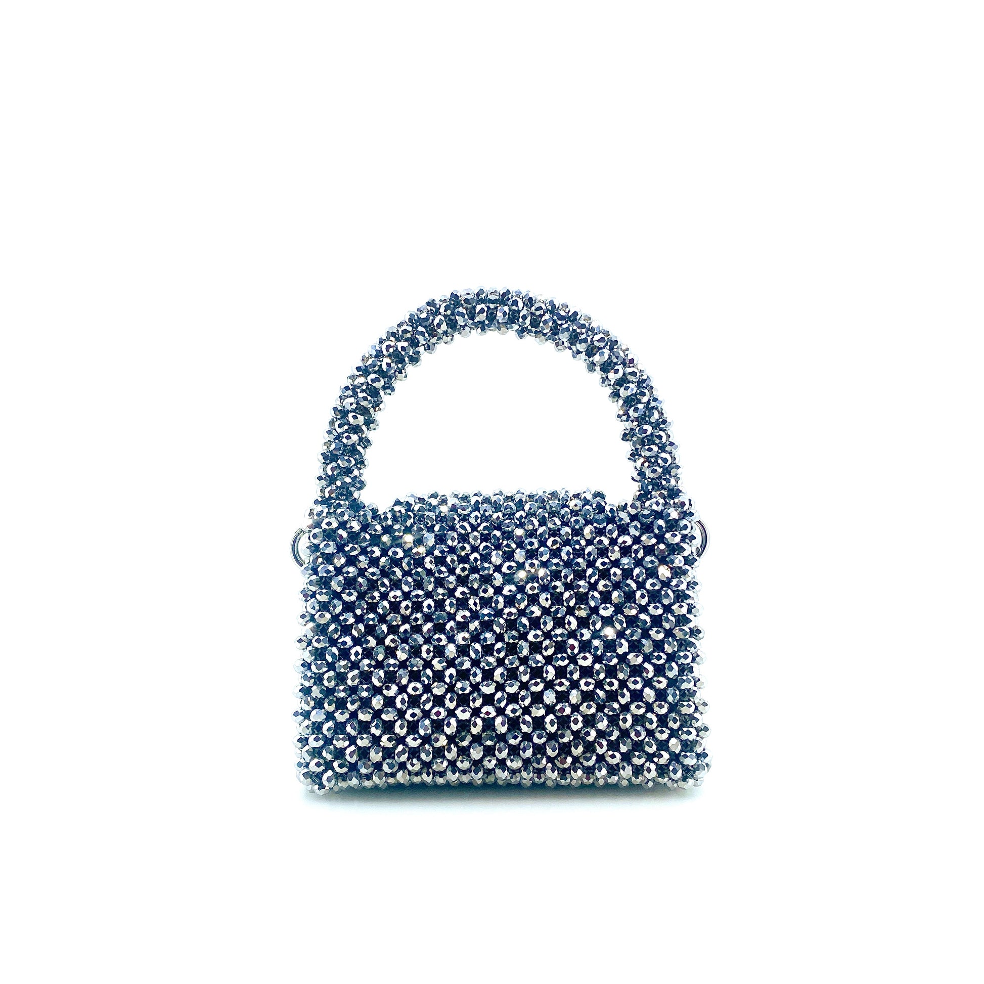 silver beaded handbag on white background