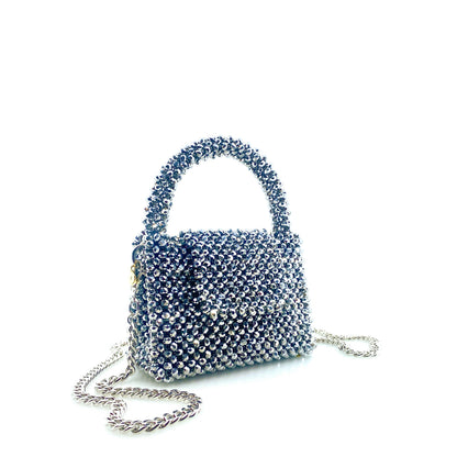 silver beaded handbag with silver chain. on white background