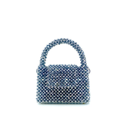 silver beaded handbag on white background