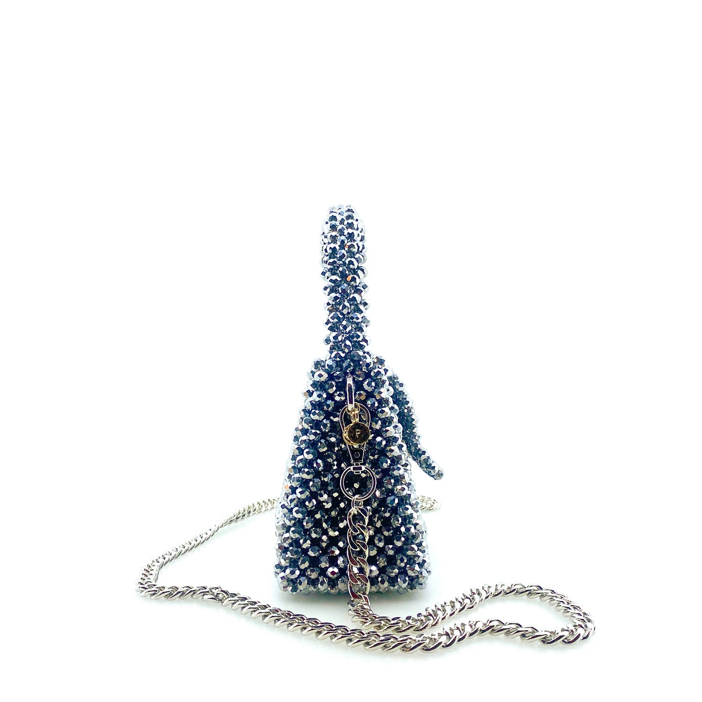 silver beaded handbag with silver chain. on white background