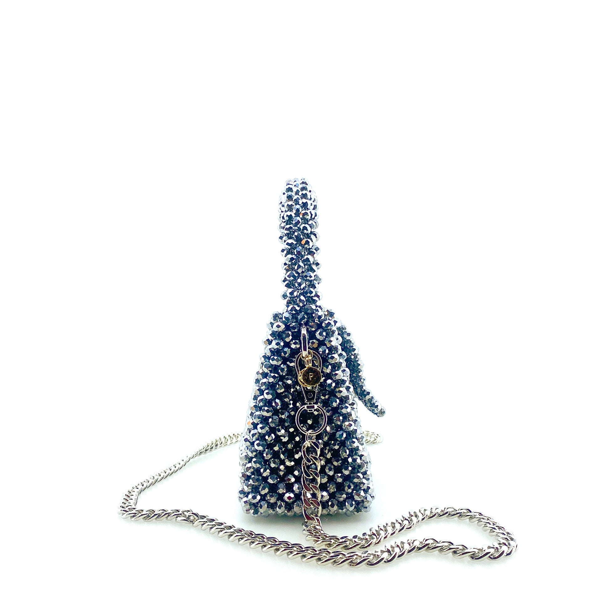 silver beaded handbag with silver chain. on white background