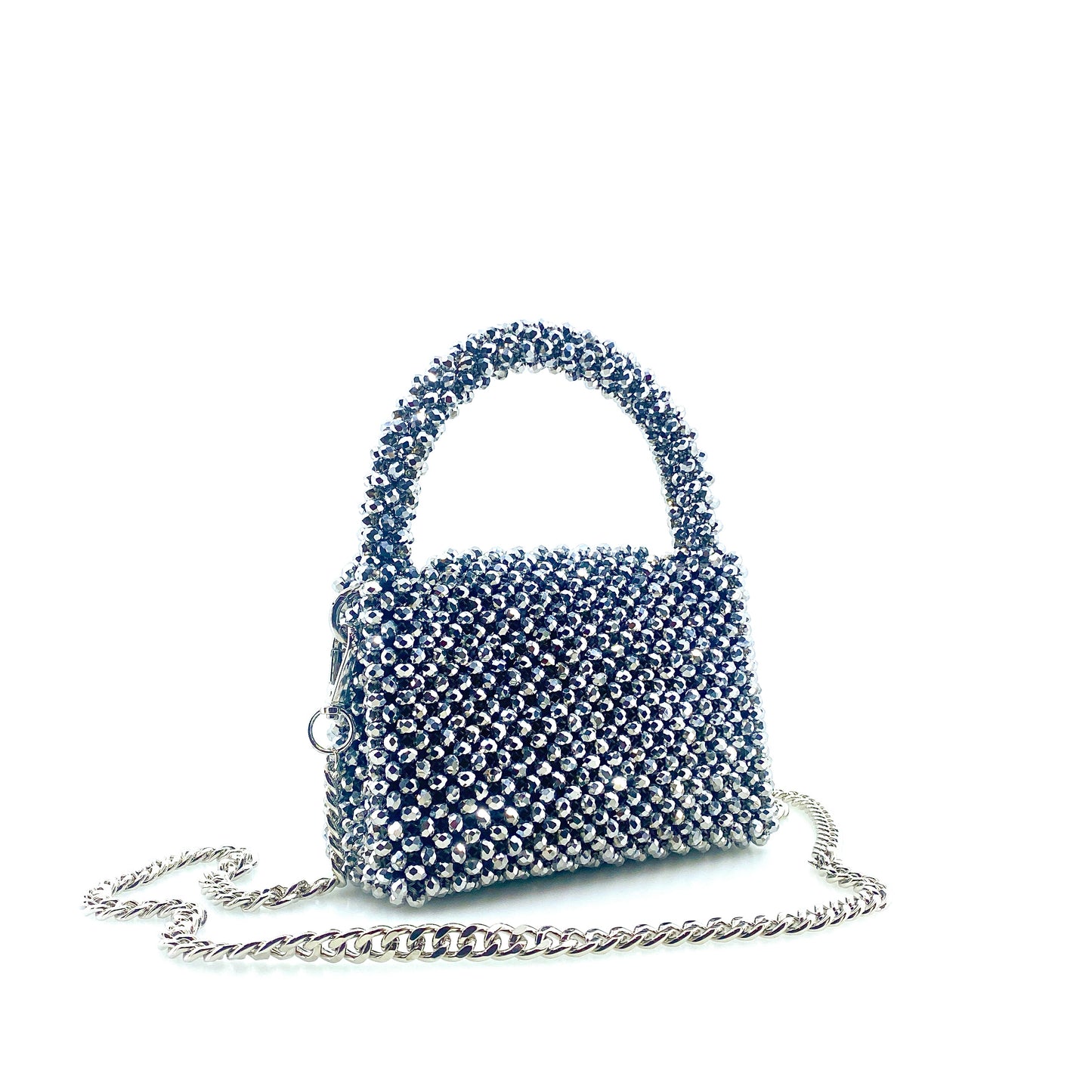 silver beaded handbag with silver chain. on white background