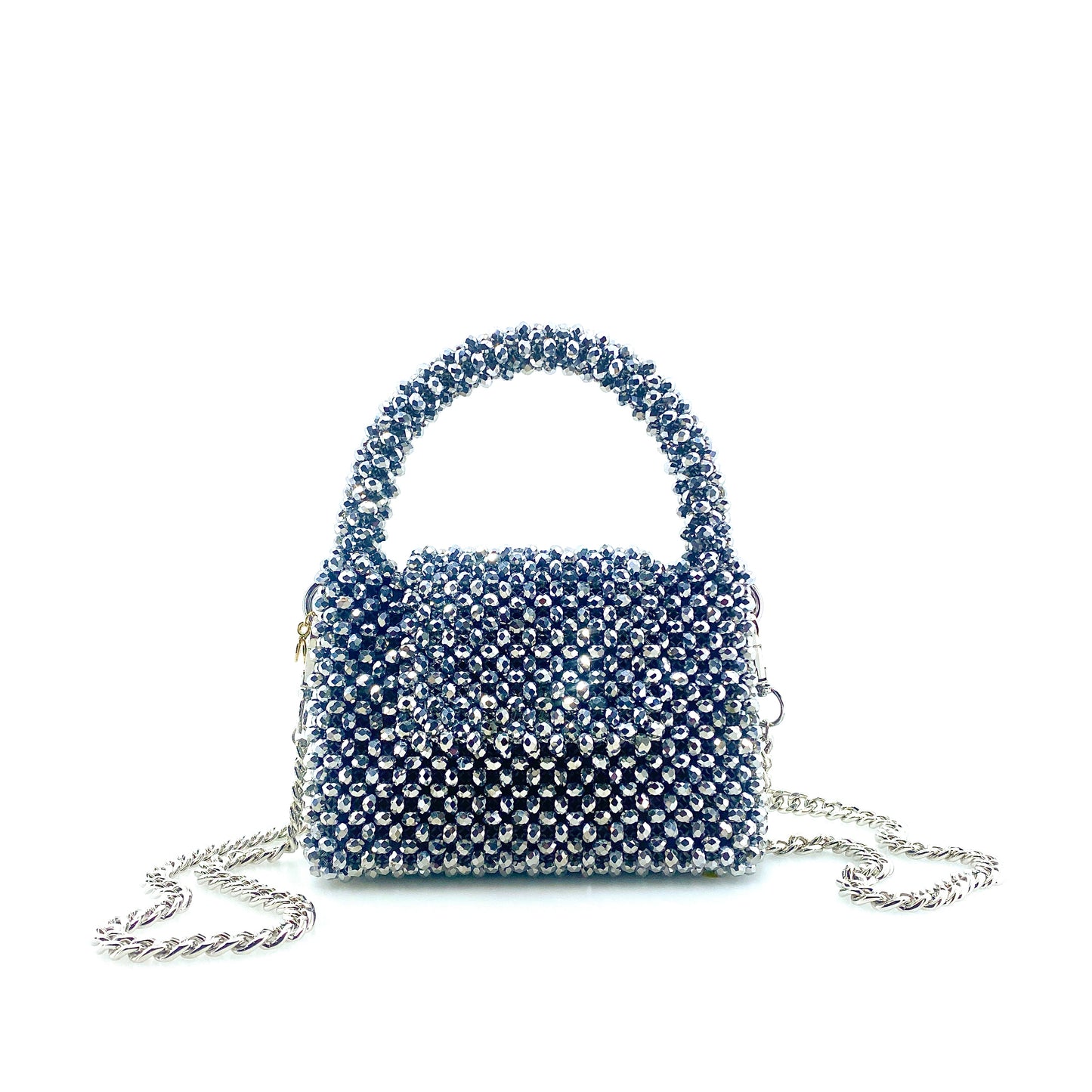 silver beaded handbag with silver chain. on white background