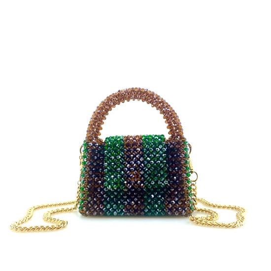 rotating video of brown and green stripe beaded handbag. on white background