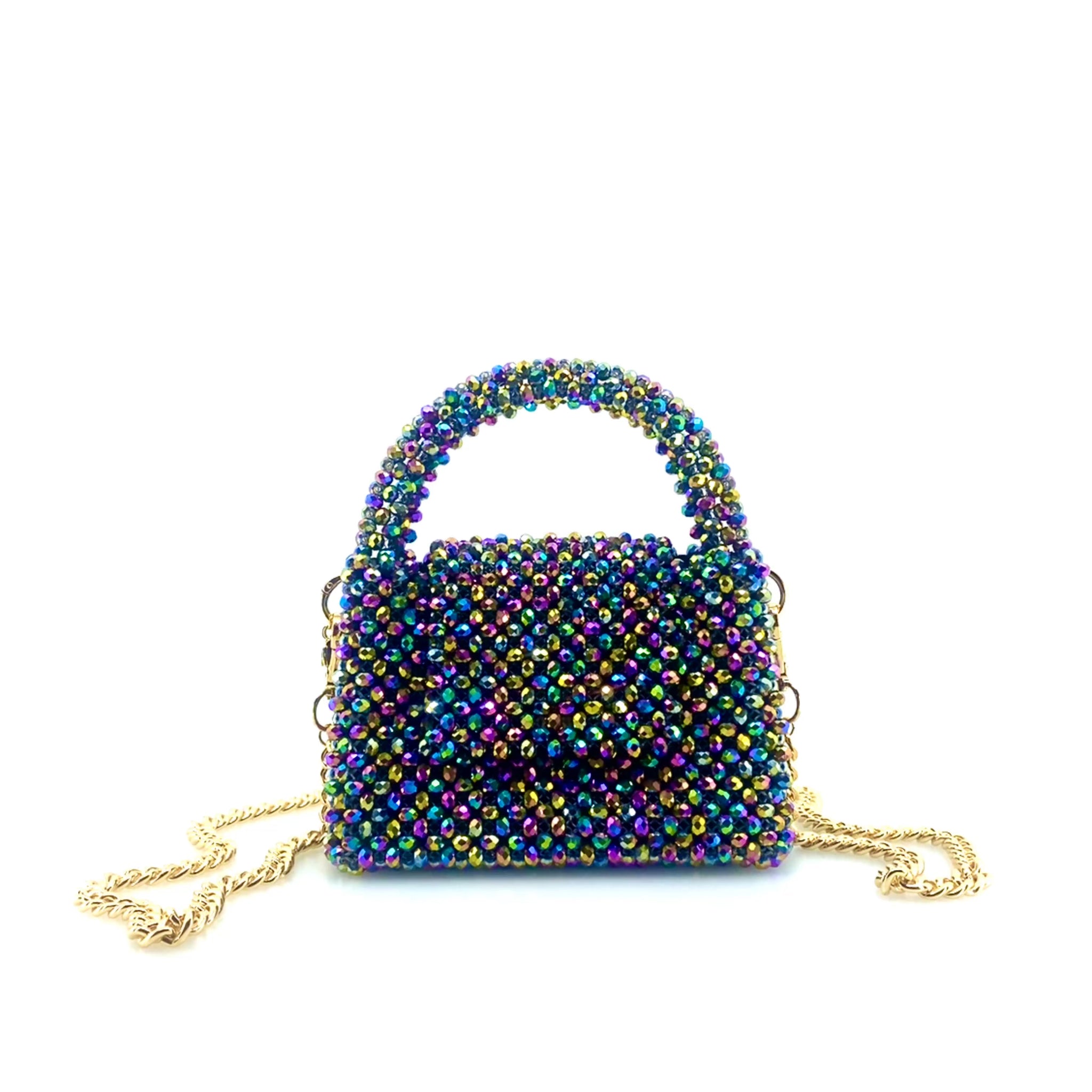 rotating video of multicoloured rainbow beaded handbag with gold chain. on white background